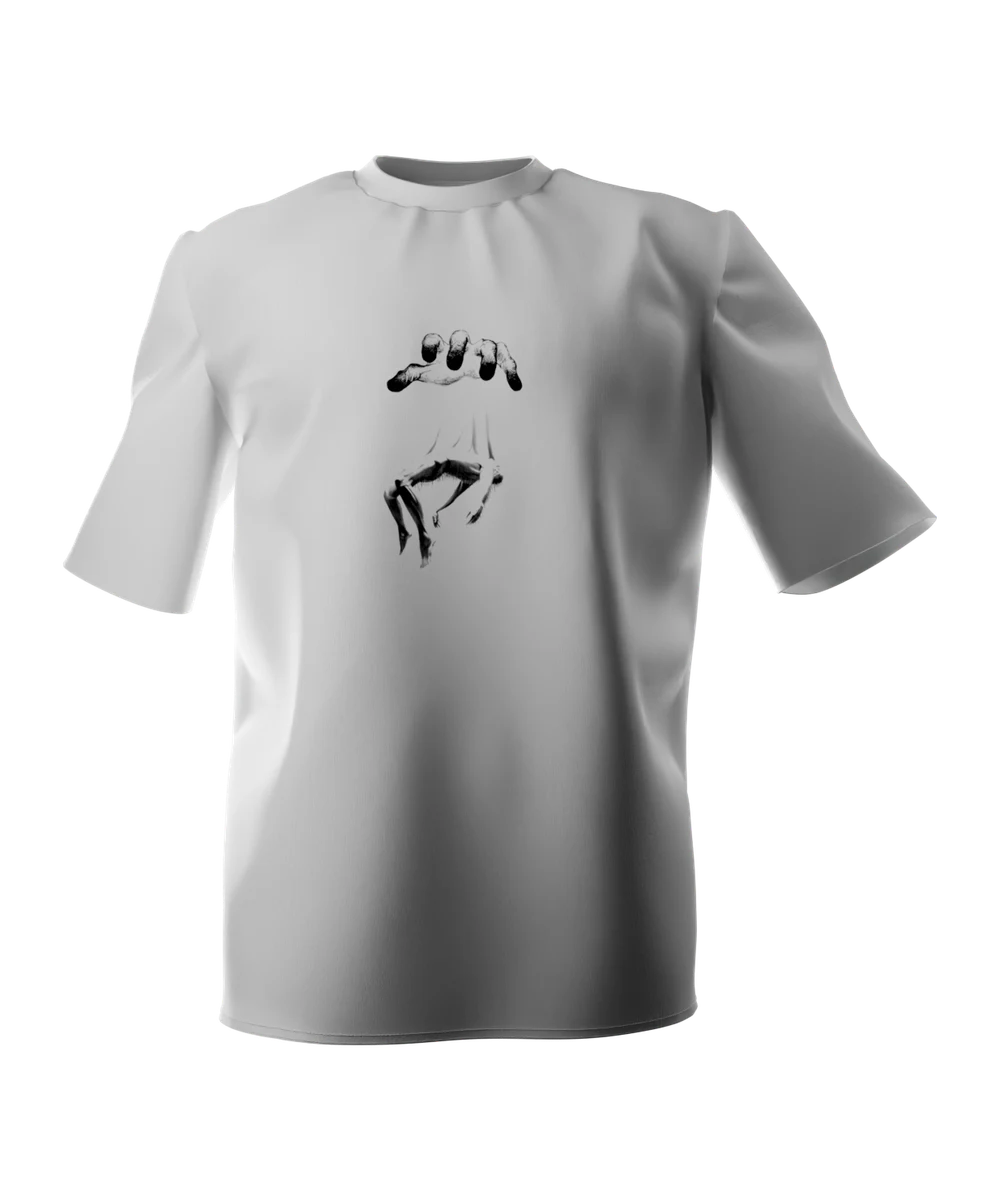 White t-shirt seen from the front, printed across the chest with a graphite drawing of a giant hand opening above a limp falling body, long strands trailing between them.