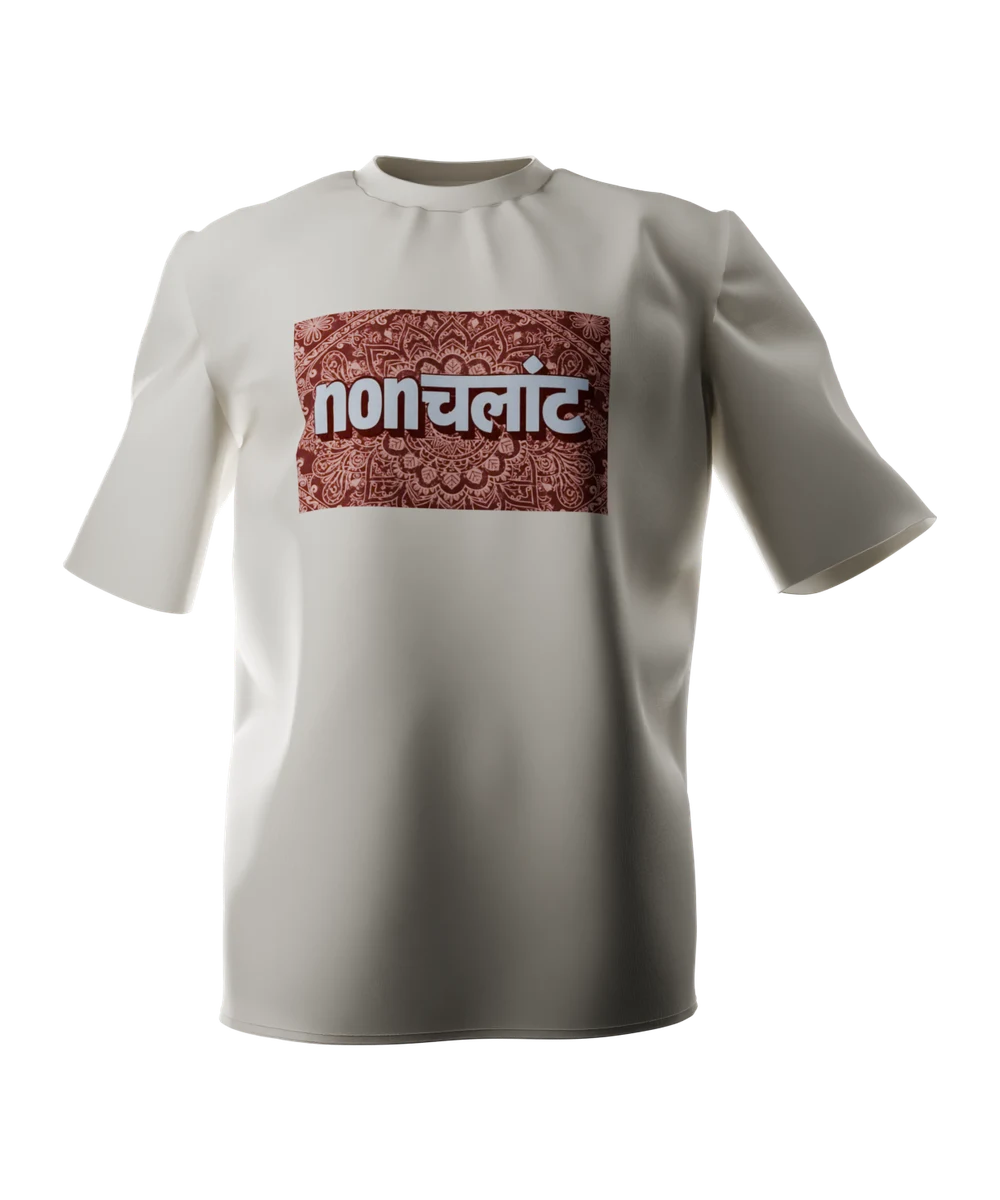 Bone t-shirt seen from the front, printed across the chest with the word nonchalant, half in Latin and half in Devanagari script, in pale blue on a dark maroon paisley panel.
