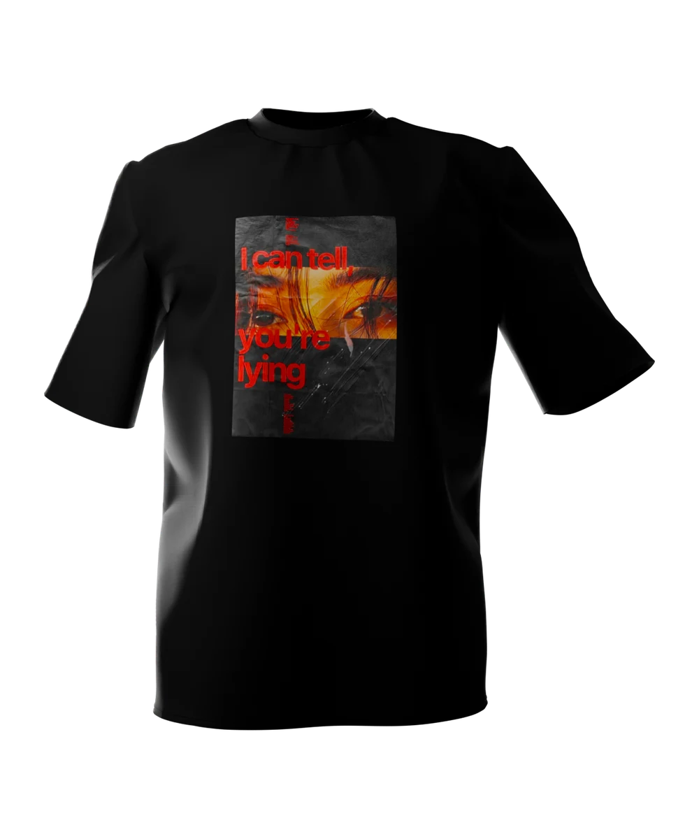 Black t-shirt seen from the front, printed across the chest with the words I can tell, you're lying in red type across a close-up of a pair of eyes, on a near-black panel.